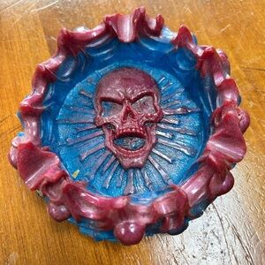Resin skull ashtray 5” by 2” - edges decorated with skull heads- fun piece -new